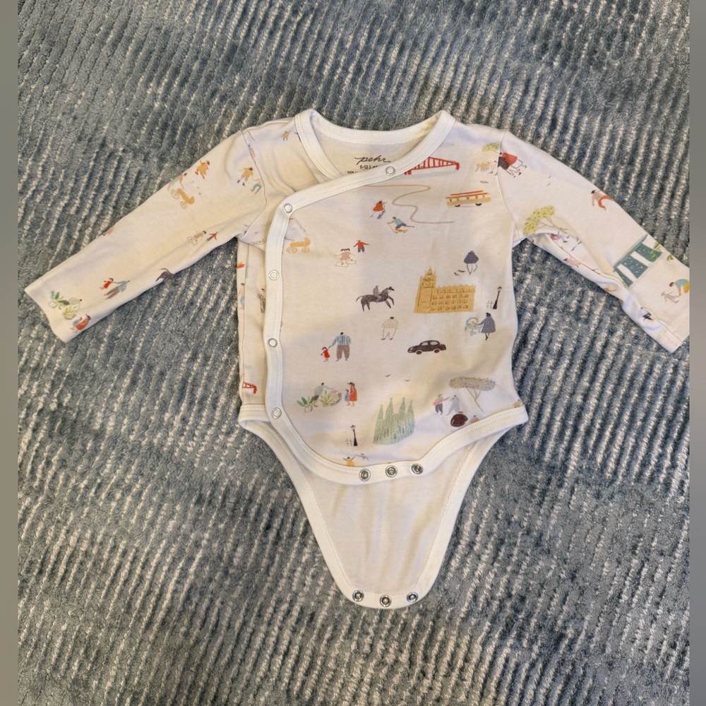 Charming Cream Kids Bodysuit with Playful Prints